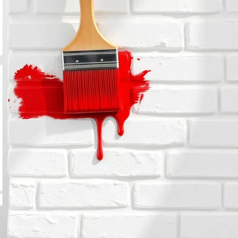 Malowanie białej cegły na czerwono